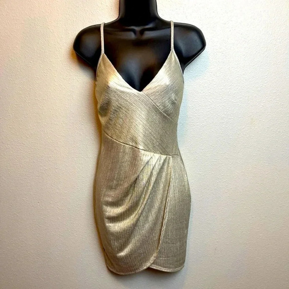 Fashion Nova metallic gold bodycon dress with tulip flap detail in front. - Picture 2 of 11